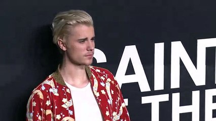 Cute Justin Bieber moments at the Saint Laurent fashion show in Los Angeles - February 10, 2016