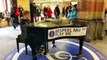 Mees, a 13 year old boy, plays piano at Amsterdam Central Station