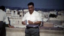 1954: Old Italian man pretending drink entire espresso coffee pot. ROME, ITALY