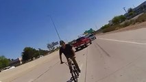 Idiot Rides His Bicycle The Wrong Way On The Highway