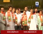 Local BJP leaders stick banners on the train that carried water to drought-hit Latur