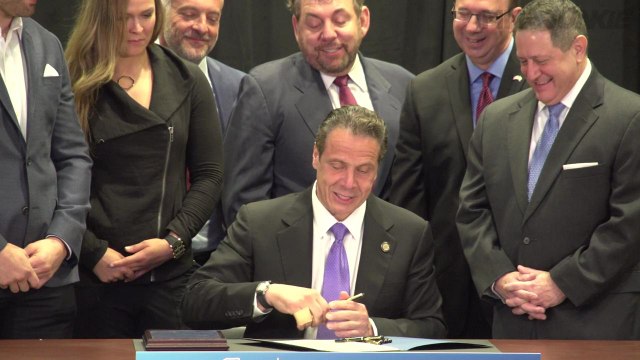 Gov. Cuomo, UFC fighter witness signing of MMA legalization bill