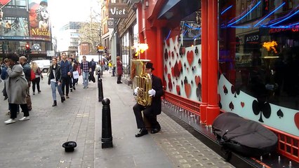 Buskers In London Want Your Money So Much That They&#39;re Now Playing With Fire