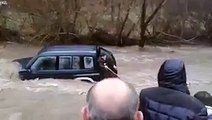 old man is rescued from deadly flood waters with rope