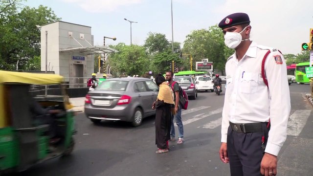 India's smog-choked capital imposes driving restrictions