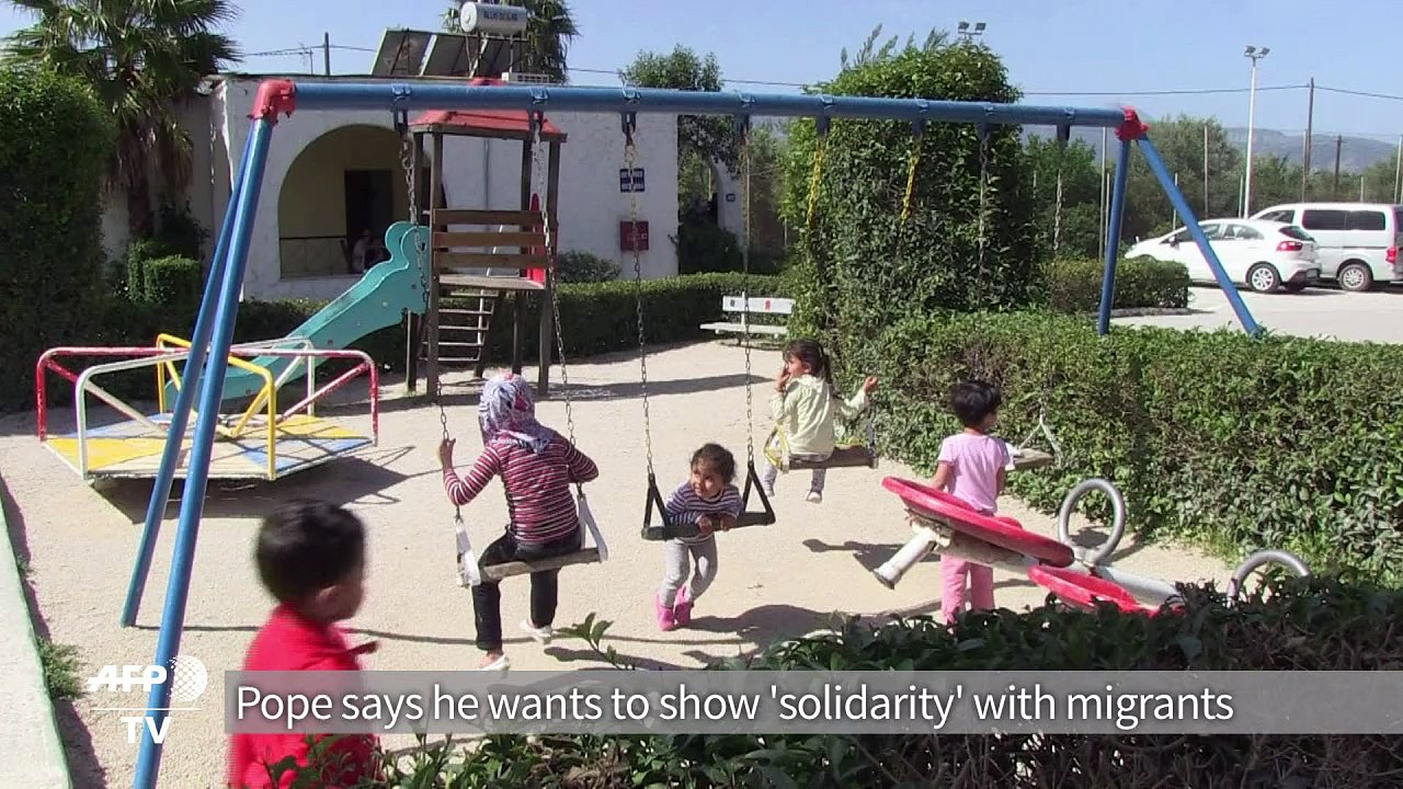 Migrants hopeful for a miracle during Pope's visit to Lesbos