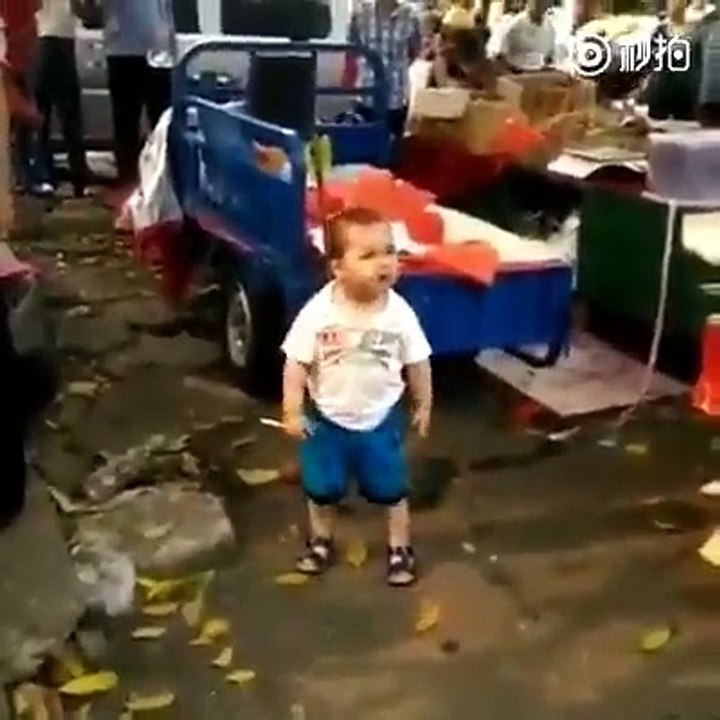 A little kid challenging the police in China for his grandmother