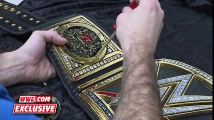 Roman Reigns receives his customized WWE Title plates  April 4, 2016