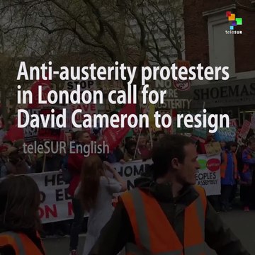 Anti-austerity protesters in London call for David Cameron to resign