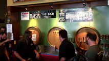 The Crew from Bruery Terreux tapping a live barrel of Cascade Brewing Orange Marmalade
