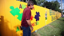 Packers fence promotes autism awareness