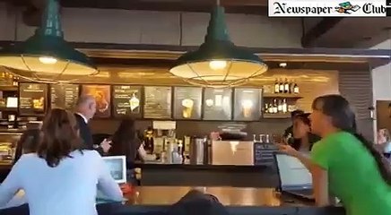 Florida Governor Rick Scott gets an earful at Starbucks