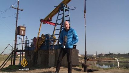 Azerbaijan’s economy hit hard by falling oil prices