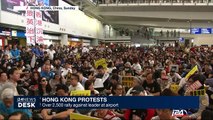 Hong Kong Protests: over 2500 rally against leader at airport