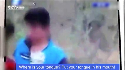 Footage: Boys forced to kiss on tape in bullying scandal