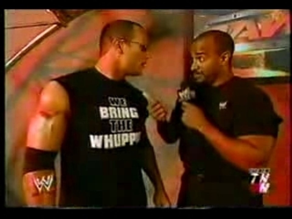 Rock makes fun of HHH and lesnar