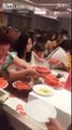 Eaters rush to take plateful of jumbo shrimp at buffet