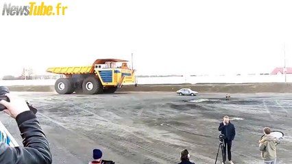 Car gets crushed by 450 ton truck