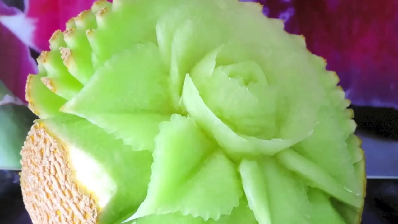 Flower carved in cantaloupe - J.Pereira Art Carving