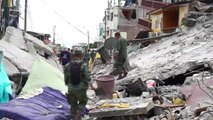 Emergency Services Search for Victims in Rubble Near Quake Epicentre