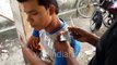 Roadside ear wax cleaning in India - Odd Jobs in India : wildindiafilms