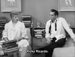 Dad telling bed time story to young daughter