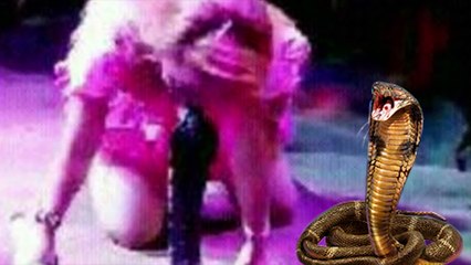 WOMAN ATTACKED BY A KING COBRA WHILE PERFORMING