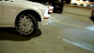 White Ford Mustang on 24