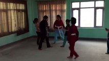 Girls practice Self Defense and Kicking before the 7AM Taekwondo Class at Metta Center, Banepa Nepal