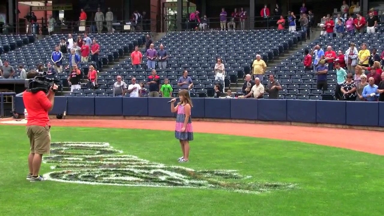 Ava Preston sings the National Anthem at the Akron Rubber Ducks game