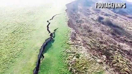 Incredible drone footage shows 900ft crack along face of Britain's Jurassic Coast following massive