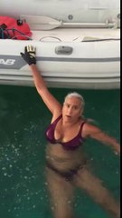 Lady Shows A Simple And Effortless Way To Get Into A Dingy If You Are Stuck In The Water.