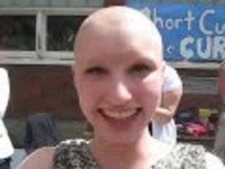 Blonde girl headshave for charity