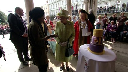 Bake Off winner Nadiya Hussain presents Queen with cake
