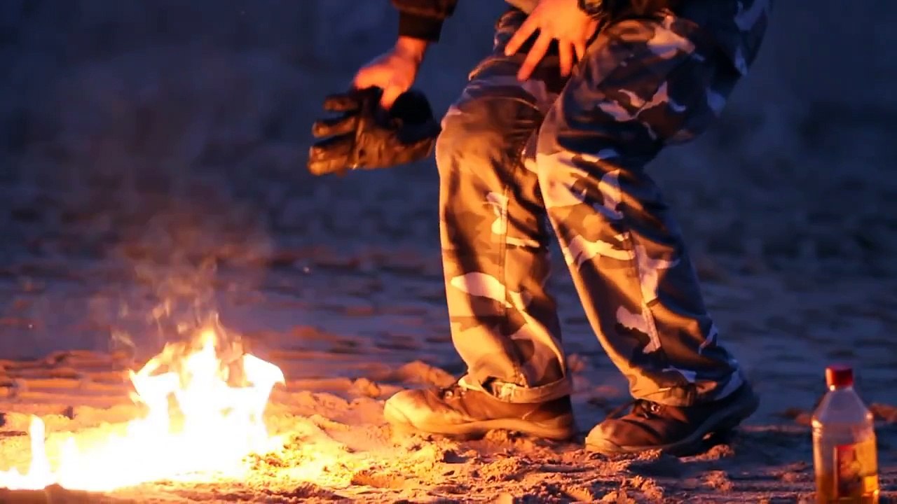 Fire dancing duet. Poi and fire fans