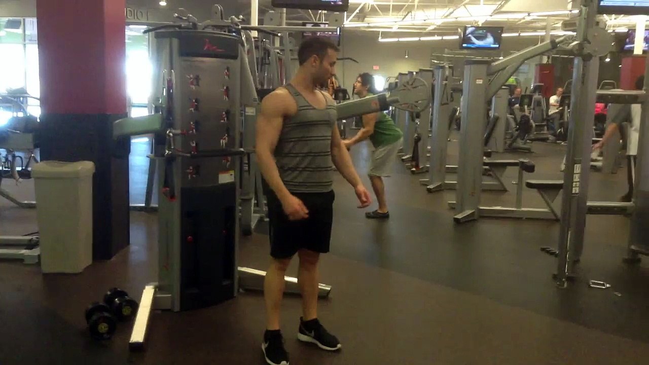 How To Do The Standing Chest Press - Fitness Training For Males -FxFitness.ca