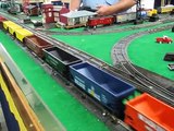 Three American Flyer trains in action on the ACSG layout