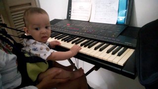 Little baby playing the piano #2