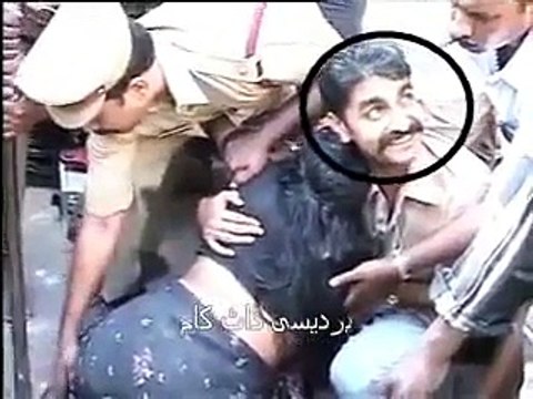 Indian People tease woman stuck in concrete at road