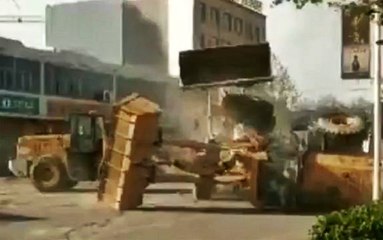 Front Loaders Fight Over Construction Contract