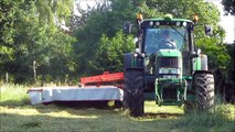 John Deere 6630 mowing grass