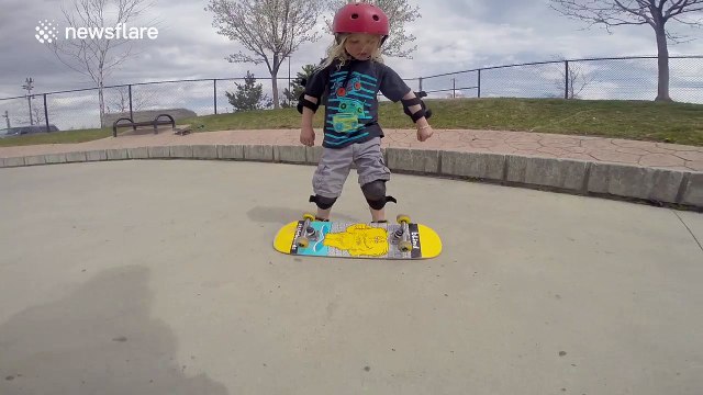 Four-year-old snowboarder hits rails, jumps and cliffs