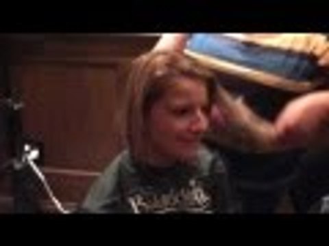 Girl shaves her hair for charity