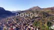 Aerial Flight Above Sunny Mountain Town, 4K, aerial drone