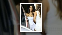 Kim Kardashian Flaunts Curves and Cl**vage in White Jumpsuit