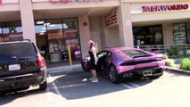 Blac Chyna shows off the purple Lamborghini from Rob Kardashian