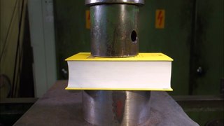 Crushing book with hydraulic press