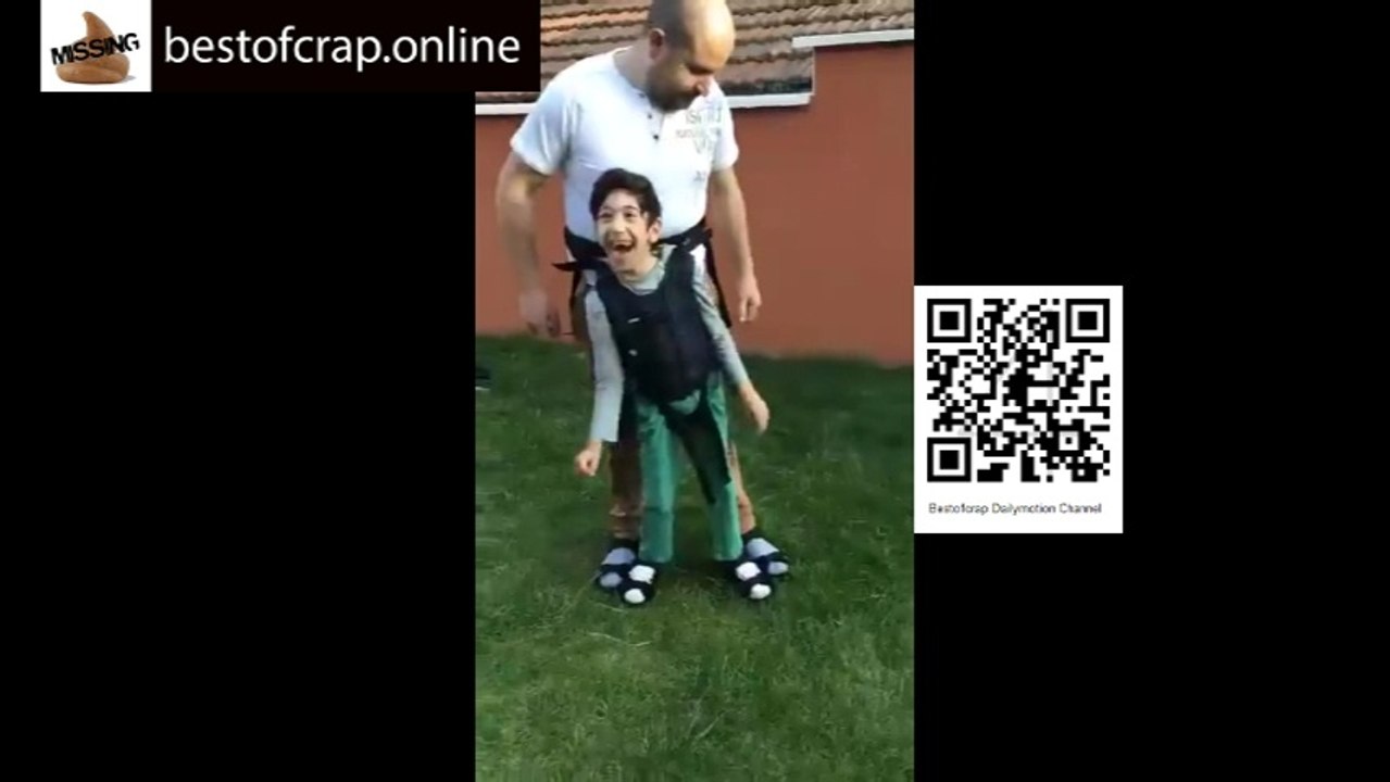 Father made his son who can't stand and walk a device strapped to him and that smile on his face says it all