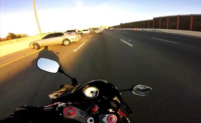 With No Time To React, Biker Successfully Dodges Wreck On Highway