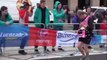 Man sings with microphone while running the London Marathon